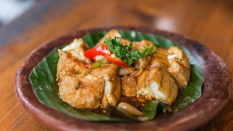 Close up shot of Indonesian local cuisine tahu gejrot ( fried tofu in chili soy sauce )