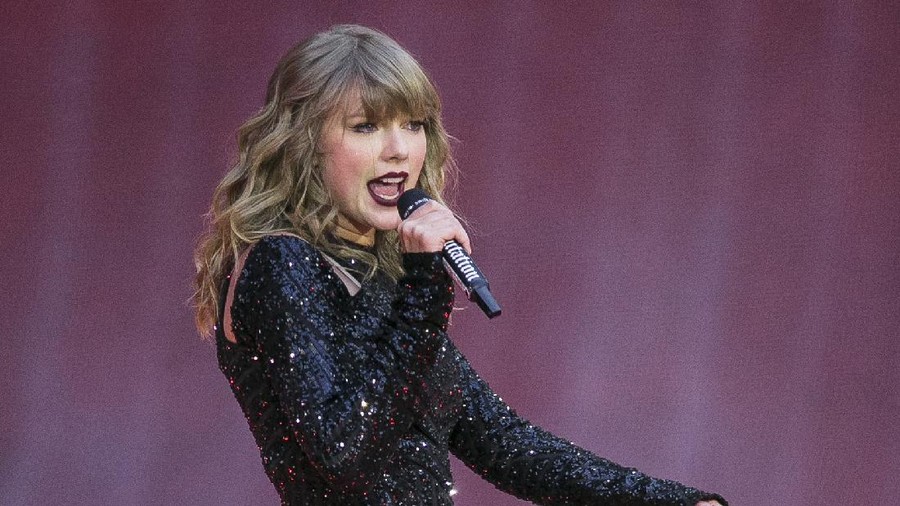 FILE - In this June 22, 2018, file photo, singer Taylor Swift performs on stage in concert at Wembley Stadium in London. Swift is canceling all of her performances and appearances for the rest of the year because of the coronavirus pandemic. “With many events throughout the world already cancelled, and upon direction from health officials in an effort to keep fans safe and help prevent the spread of COVID-19, sadly the decision has been made to cancel all Taylor Swift live appearances and performances this year,
