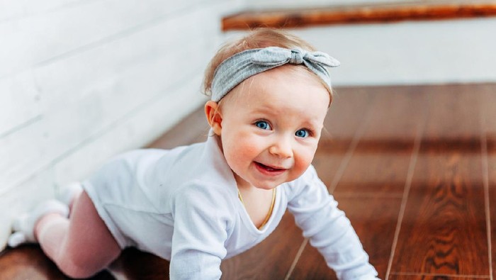 Happy baby girl. Happy little princess.