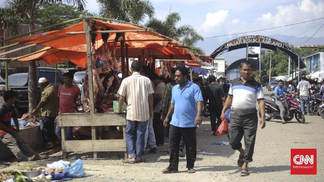 Pasar Lambaro Penjual daging di Pasar Lambaro, Aceh Besar. (CNN Indonesia/Dani Randi)