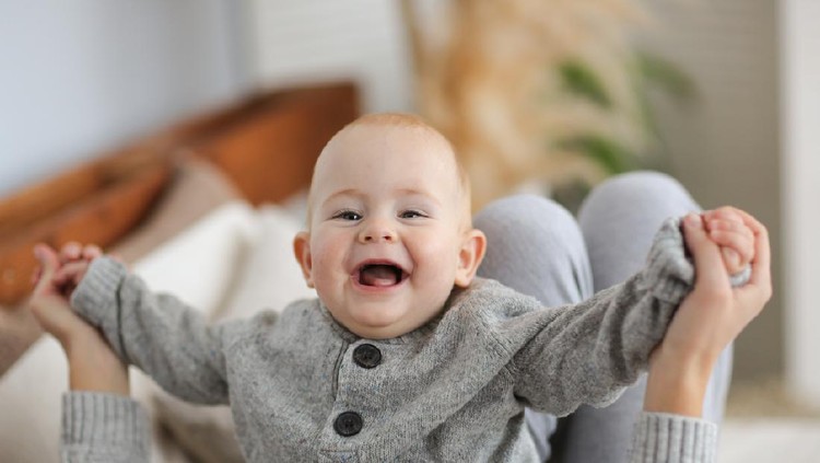 Happy baby girl. Happy little princess.