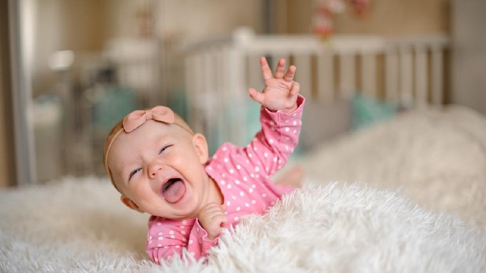 Happy baby girl. Happy little princess.
