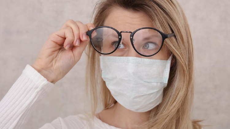Medical mask and Glasses fogging. Avoid face touching, Coronavirus prevention, Protection.