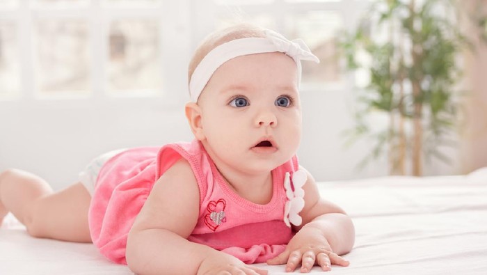 Happy baby girl. Happy little princess.