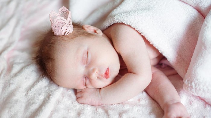 Happy baby girl. Happy little princess.