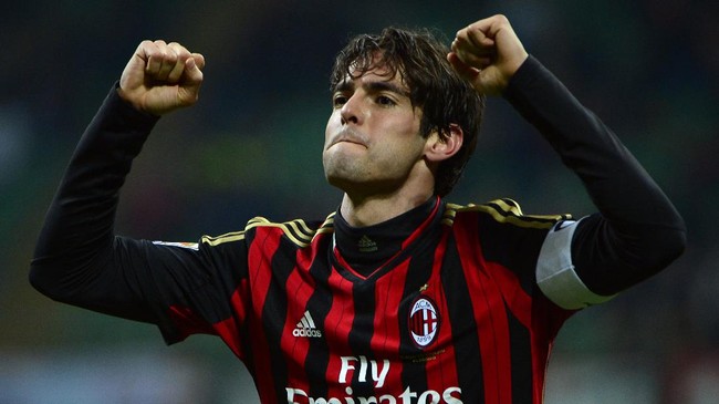 AC Milan's Brazilian forward Kaka celebrates with teammates after scoring during the Italian serie A football match AC Milan vs Chievo Verona, on March 29, 2014 in San Siro stadium in Milan. AFP PHOTO / OLIVIER MORIN (Photo by Olivier MORIN / AFP)
