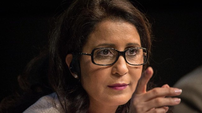 The Vice-President of the International Olympic Committee (IOC), Nawal El Moutawakel, gestures during the closing news conference of the IOC Coordination Committee sixth meeting for the Rio 2016 Olympic and Paralimpic Games, on March 21, 2014 in Rio de Janeiro, Brazil. The IOC's coordination committee gathered in Rio during three days to unveil the body's overall assessment of preparations for South America's first Olympiad.   AFP PHOTO / YASUYOSHI CHIBA (Photo by YASUYOSHI CHIBA / AFP)