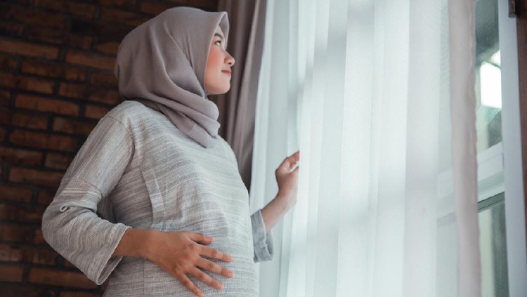 Ilustrasi wanita muslim hamil