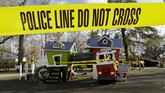 Hilangnya Wajah Ceria Taman Bermain di Dunia Police tape is used to keep people from using a playground that was closed in an effort to help prevent the spread of the coronavirus, Wednesday, March 25, 2020, in Fairway, Kan. (AP Photo/Charlie Riedel)