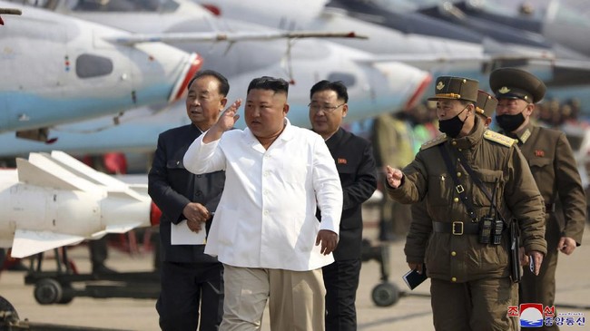 FILE - In this undated file photo provided by the North Korean government on April 12, 2020, North Korean leader Kim Jong Un inspects an air defense unit in western area, North Korea. The South Korean government is looking into reports that North Korean leader Kim Jong Un is in fragile condition after surgery. Officials from South Korea’s Unification Ministry and National Intelligence Service couldn’t immediately confirm the reports citing an anonymous U.S. official who said Kim was in “grave danger.” Independent journalists were not given access to cover the event depicted in this image distributed by the North Korean government. The content of this image is as provided and cannot be independently verified. Korean language watermark on image as provided by source reads: 