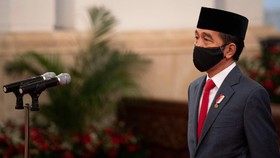 Jokowi Teken Perppu Penundaan Pilkada 2020