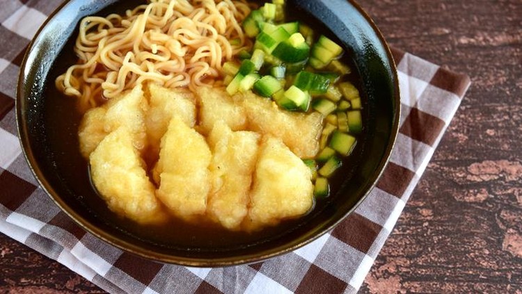 pempek Pempek or mpek-mpek, popular savory fish cake dish from Palembang, South Sumatra, Indonesia. Served in sweet and sour sauce (kuah cuka) accompanied with egg noodle and cucumber