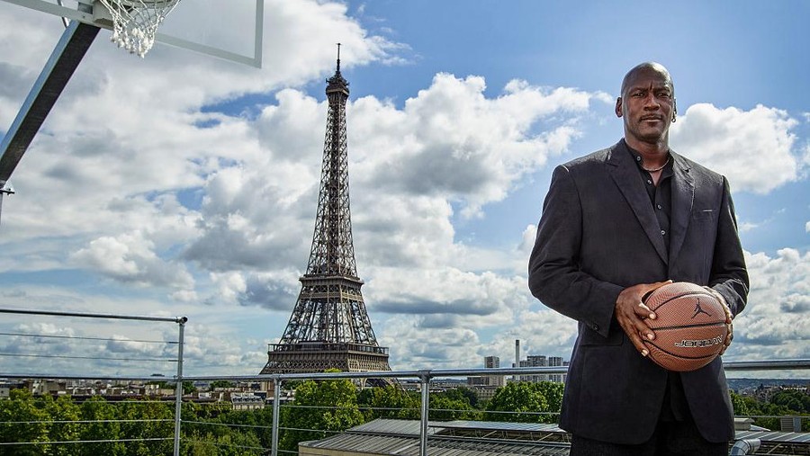 PARIS, FRANCE - JUNE 12: In this handout image provided by Jordan Brand, Michael Jordan paid a visit to Palais 23 this afternoon on Friday June 12, Joined by his frequent partners-in-design Tinker Hatfield and Mark Smith, key figures in the 30-year evolution of the Air Jordan, Jordan has returned to Paris to mark the 30th anniversary of 1985's Air Jordan One. Palais 23 is a spectacular tribute to the shoes, moments, designs and artifacts that have shaped the 30-year evolution of the Air Jordan. (Photo by Jordan Brand via Getty Images)