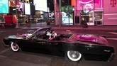 Tanpa Kemacetan Kolektor Mobil Mewah Ambil Alih Times Square In this Saturday, May 2, 2020 photo, Tina Singh relaxes in a friend's 1967 Lincoln Continental in New York's Times Square during the coronavirus pandemic. Car mavens normally wouldn't dare rev their engines in Midtown, but now they're eagerly driving into the city to take photos and show off for sparse crowds walking through the commercial hub. (AP Photo/Mark Lennihan)