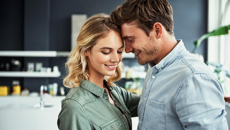 Cropped shot of an affectionate young couple relaxing at home