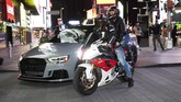 Tanpa Kemacetan Kolektor Mobil Mewah Ambil Alih Times Square In this Saturday, May 2, 2020 photo, a sports car and motorcyclists are part of the scene in New York's Times Square during the coronavirus pandemic. Car mavens and motorcyclists normally wouldn't dare rev their engines in Midtown, but now they're eagerly driving into the city to take photos and show off for sparse crowds walking through the commercial hub. (AP Photo/Mark Lennihan)
