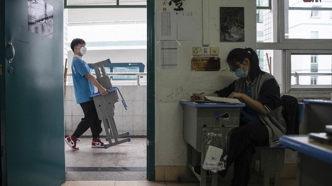 FOTO: Saat Pelajar Wuhan Kembali Bersekolah