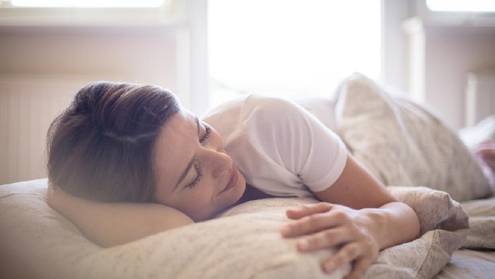There's nothing better than a lie in. Woman sleeping in bed.