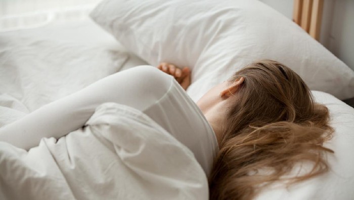 There's nothing better than a lie in. Woman sleeping in bed.