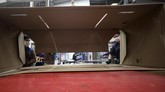 Tempat Tidur Sekaligus Peti Mati Workers at a company that designs packaging for product displays assemble a cardboard box designed to serve as both a hospital bed and a coffin, intended for COVID-19 patients, in Bogota, Colombia, Friday, May 8, 2020. Owner Rodolfo Gomez said he plans to donate the first units to Colombia's Amazonas state, and that the company will sell others to small hospitals for 87 dollars. (AP Photo/Fernando Vergara)