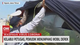 VIDEO: Kelabui Petugas, Pemudik Menumpang Mobil Derek
