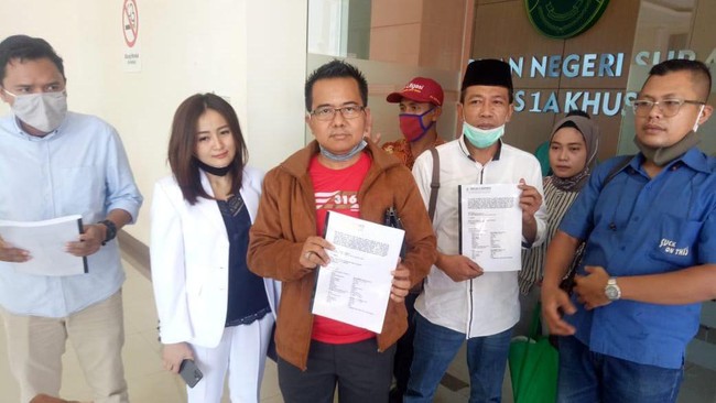 penjual kopi di Surabaya, Kusnan Hadi, melakukan gugatan uji materi Peraturan Presiden Nomor 64 Tahun 2020 tentang Perubahan Kedua Atas Perpres 82/2018 tentang Jaminan Kesehatan. (Istimewa)