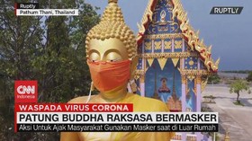 VIDEO: Patung Buddha Raksasa Pakai Masker