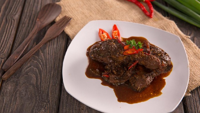 ayam semur. indonesian food of chicken with soysauce and chilli