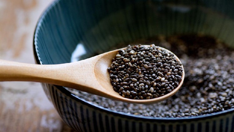Chia seed Nutritious chia seeds on a wooden spoon, superfood