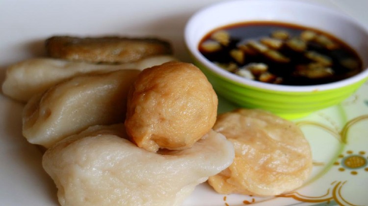 Empek-empek (fried savory fish cake) from Palembang, South Sumatra, Indonesia. Indonesian food.