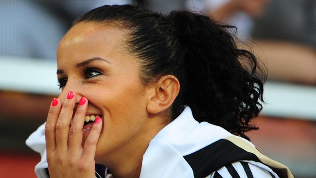 Germany's midfielder Fatmire Bajramaj smiles prior to the quarter-final match of the FIFA women's football World Cup Germany vs Japan on July 9, 2011 in Wolfsburg, northern Germany.  AFP PHOTO / JOHANNES EISELE (Photo by JOHANNES EISELE / AFP)