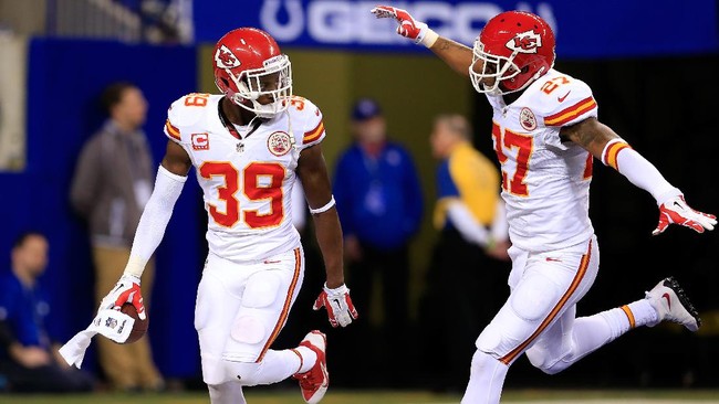 INDIANAPOLIS, IN - JANUARY 04: Defensive back Husain Abdullah #39 celebrates an interception with cornerback Sean Smith #27 of the Kansas City Chiefs against the Indianapolis Colts during a Wild Card Playoff game at Lucas Oil Stadium on January 4, 2014 in Indianapolis, Indiana.   Rob Carr/Getty Images/AFP