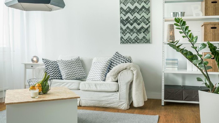 Very bright living room with white furniture