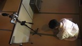 Kuil Shinto di Jepang Hibur Mereka yang Dirumah Aja In this May 8, 2020, photo, a priest prays while checking the device for a livestream prayer during a 10-day trial of