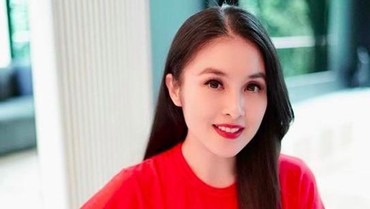 Unggah Foto Perut Buncit, Sandra Dewi Kode Hamil Anak Ketiga?