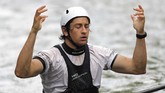 Latihan Atlet Kayak AS Jelang Olimpiade 2020 Tyler Uthus Westfall, a kayak athlete on the Team USA kayak team, reacts after his coach Silvan Poberaj told him his timing on a practice run on the Potomac River during a training session, Friday, May 22, 2020, in Brookmont, Md. Westfall's summer plans to participate in the Tokyo 2020 Olympics have been pushed back for a year after the games were postponed because of the coronavirus outbreak. (AP Photo/Julio Cortez)