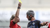 Sisi Lain Bundesliga Referee Bibiana Steinhaus shows Klaus Gjasula of SC Paderborn 07 the yellow card during the Bundesliga soccer match between SC Paderborn 07 and TSG 1899 Hoffenheim in Paderborn, Germany, Saturday, May 23, 2020. (Friso Gentsch/pool via AP)