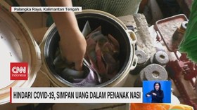 VIDEO: Cegah Covid-19, Pedagang Simpan Uang di Penanak Nasi