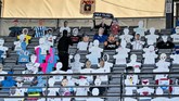 Suporter Dukung Liga Denmark via Zoom Cardboard figures are displayed in the seats during the Danish Super League soccer match between AGF and Randers FC via videolink, at Ceres Park in Aarhus, Denmark, Thursday, May 28, 2020. The match is the first to be played after the shutdown due to the outbreak of the coronavirus and is being played without spectators and with restrictions. (Henning Bagger/Ritzau Scanpix via AP)