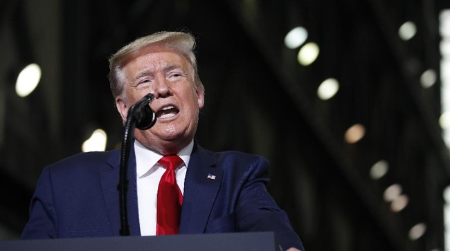 President Donald Trump speaks during an event at the Vehicle Assembly Building on Saturday, May 23, 2020, after viewing the SpaceX flight at NASA's Kennedy Space Center in Cape Canaveral, Fla. A rocket ship designed and built by SpaceX lifted off on Saturday with two Americans on a history-making flight to the International Space Station. (AP Photo/Alex Brandon)