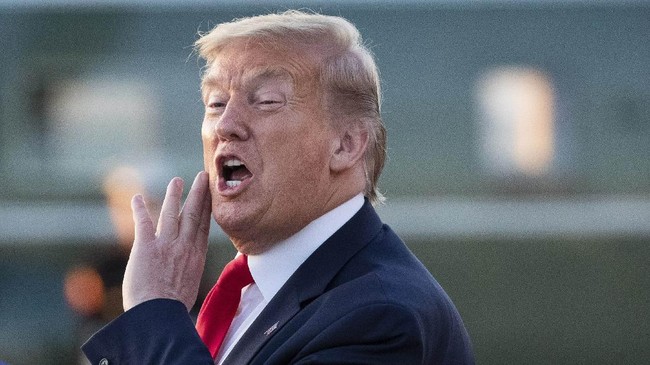 President Donald Trump speaks with reporters as he steps off Air Force One as he returns Saturday, May 30, 2020, at Andrews Air Force Base, Md. Trump is returning from Kennedy Space Center for the SpaceX Falcon 9 Launch. (AP Photo/Alex Brandon)