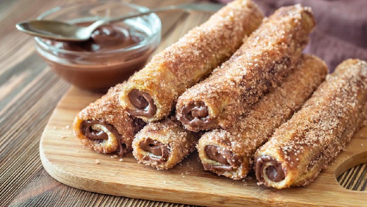 French toast roll-ups on the wooden board