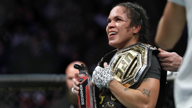 LAS VEGAS, NEVADA - DECEMBER 14: UFC women's bantamweight champion Amanda Nunes smiles after her unanimous-decision win over Germaine de Ranamie during UFC 245 at T-Mobile Arena on December 14, 2019 in Las Vegas, Nevada.   Steve Marcus/Getty Images/AFP