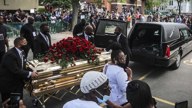 George Floyd's casket carried to a hearse after a memorial service for Floyd at North Central University, Thursday, June 4, 2020, in Minneapolis. Floyd died after being restrained by Minneapolis police officers on May 25. (AP Photo/Bebeto Matthews)