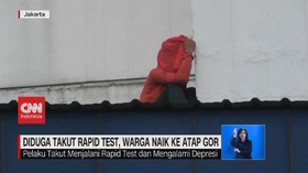 VIDEO: Diduga Takut Rapid Test, Wanita Nekat Naik ke Atap GOR
