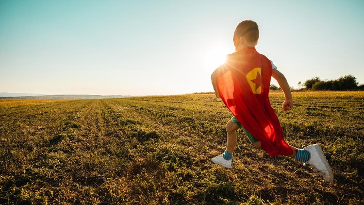 Young Boy Dressed as Superhero