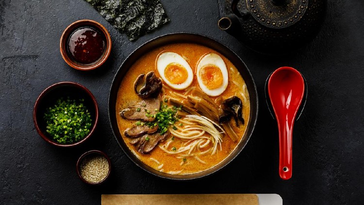 1159943780 Close up shot of miso noodle ramen with chopped pork meat and soft boiled egg