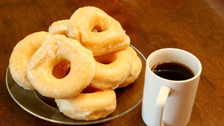 Cup of hot coffee and a plate full of donuts.  Can't get much better.