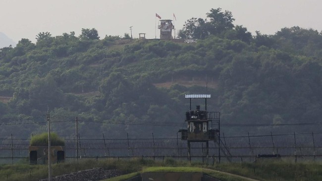 Military guard posts of North Korea, rear, and South Korea, foreground, are seen in Paju, at the border with North Korea, South Korea, Tuesday, June 16, 2020. North Korea blew up an inter-Korean liaison office building just inside its border in an act Tuesday that sharply raises tensions on the Korean Peninsula amid deadlocked nuclear diplomacy with the United States. (AP Photo/Ahn Young-joon)