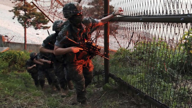 South Korean Marines patrol on Yeonpyeong Island, South Korea, Tuesday, June 16, 2020. North Korea blew up an inter-Korean liaison office building just north of the heavily armed border with South Korea on Tuesday in a carefully choreographed display of anger that sharply raises tensions on the Korean Peninsula and puts pressure on Washington and Seoul amid deadlocked nuclear diplomacy. (Kim In-chul/Yonhap via AP)